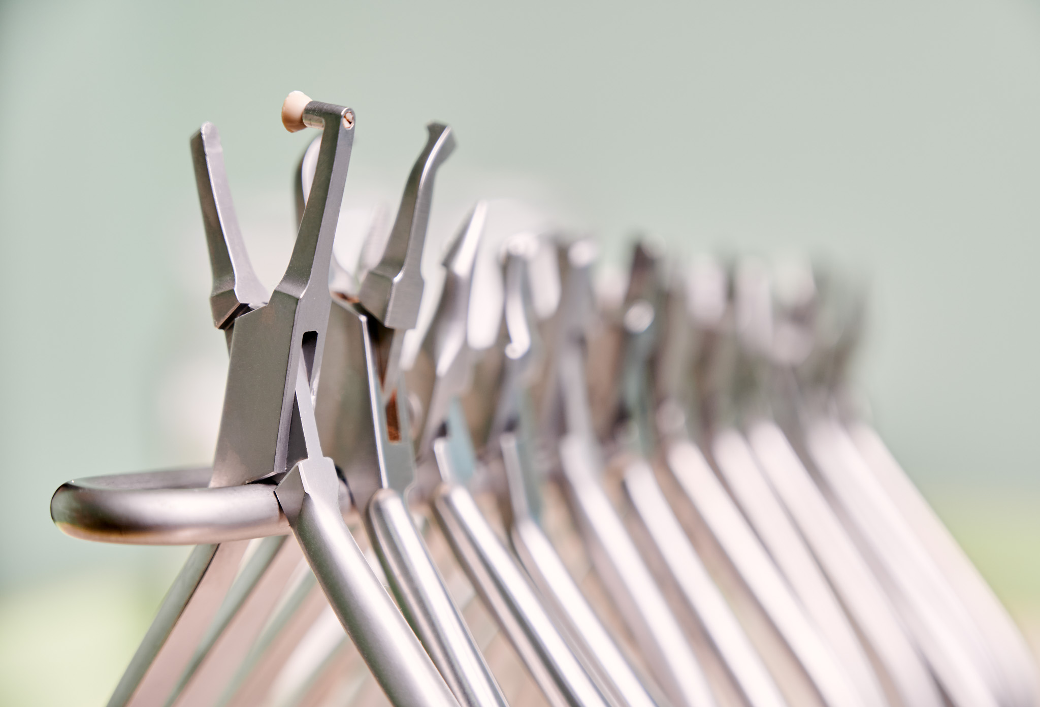 Collection of orthodontic instruments for dental procedure.